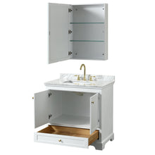 Load image into Gallery viewer, Wyndham Collection WCS202036SWGCMUNSMED Deborah 36 Inch Single Bathroom Vanity in White, White Carrara Marble Countertop, Undermount Square Sink, Brushed Gold Trim, Medicine Cabinet